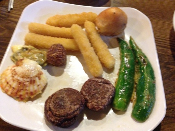 Round 2 (starting lower left corner and going clockwise): scallop, taro ball, cheese sticks, potato bread, chilies, millet cakes.